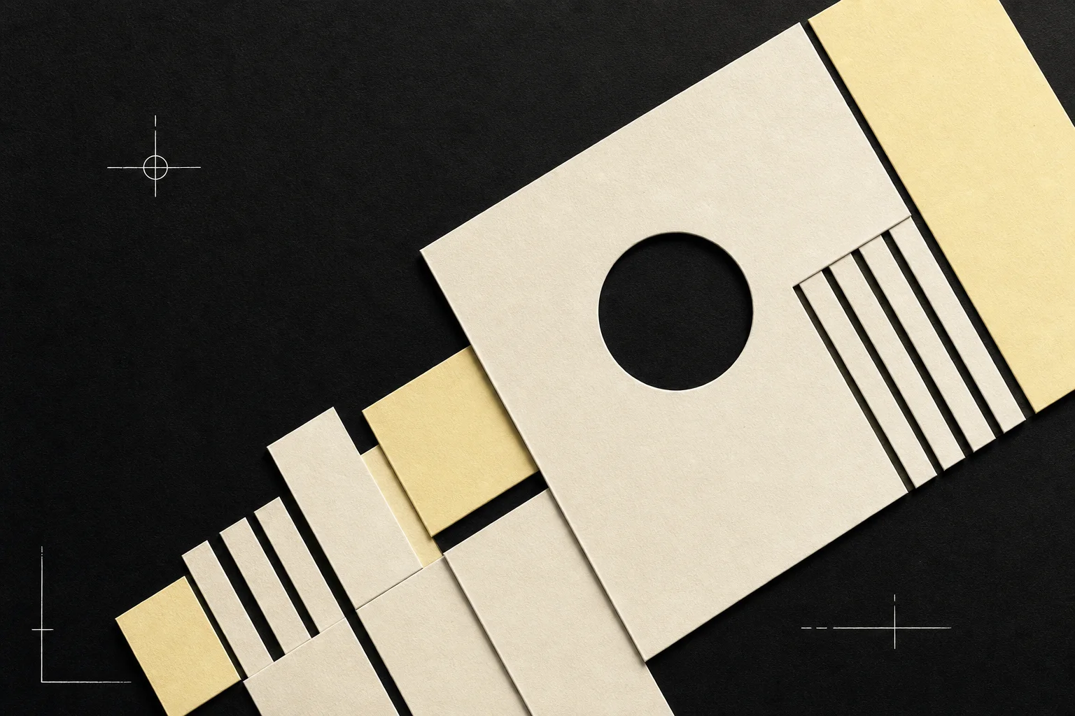 Tactile cream and bone paper geometry on a black field